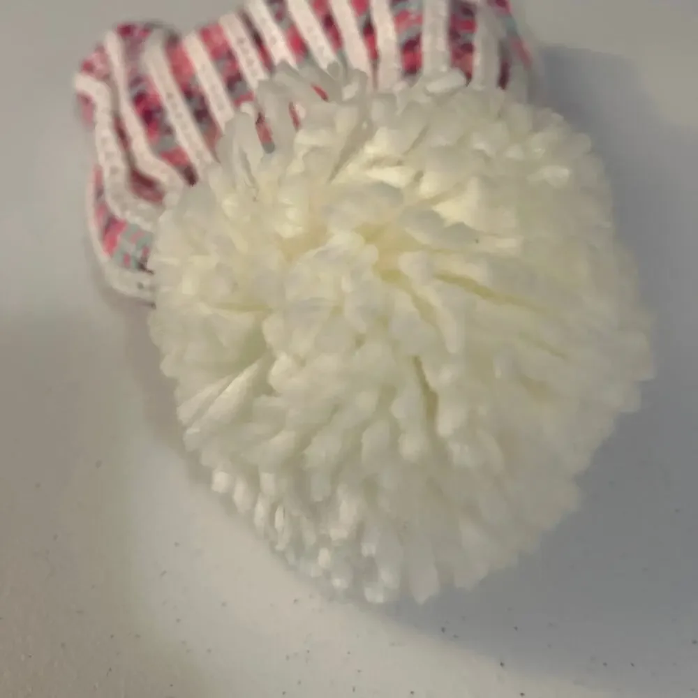 Pink and White Beanie with Puff Ball at the Top